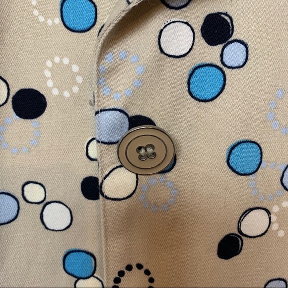 I.e. Tan trench coat with Mod circle design. - Picture 5 of 8